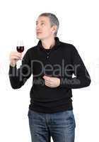 Man holding a glass of red port wine