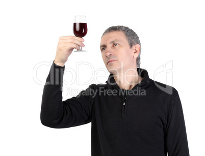 Man holding a glass of red port wine