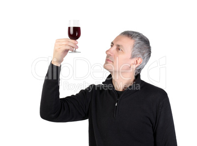 Man holding a glass of red port wine