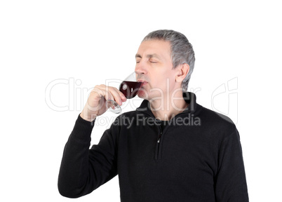 Man tries a glass of red port wine