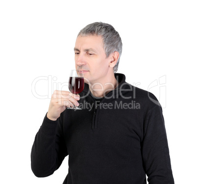 Man holding a glass of red port wine