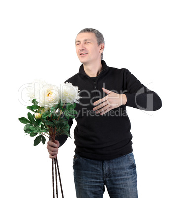 Man holding a bouquet of flowers