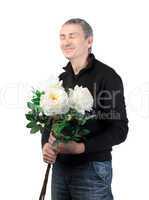 Man holding a bouquet of flowers
