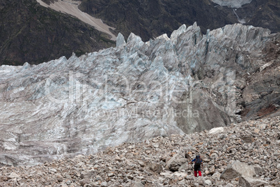 Hiker on glacier moraine