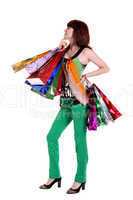 Female hand holding colorful shopping bags isolated on a white b