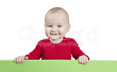 young child holding shield