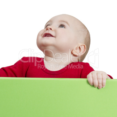 young child holding shield