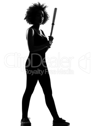 young afro american woman silhouette holding a baseball bat