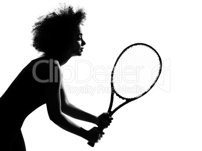 young afro american woman silhouette playing tennis