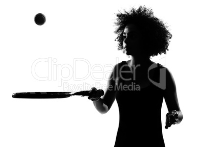 young afro american woman silhouette playing tennis