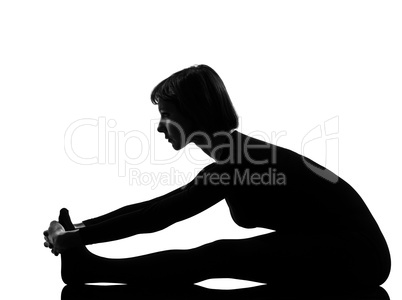 woman paschimottanasana yoga pose