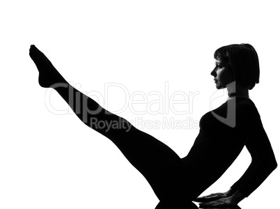 woman paripurna navasana boat pose yoga