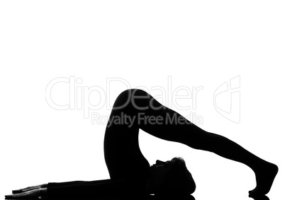 woman halasana Shoulder Stand yoga pose.