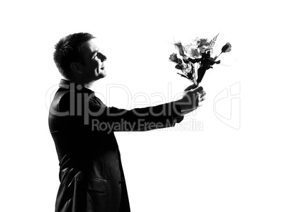 silhouette one man holding offering  flowers bouquet