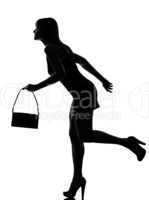 stylish silhouette woman running holding purse