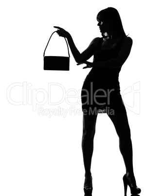 stylish silhouette woman holding purse w