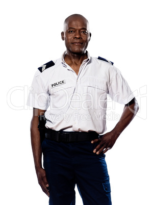 Portrait of policeman with hand on waist