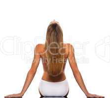 Blond haired woman stretching backwards