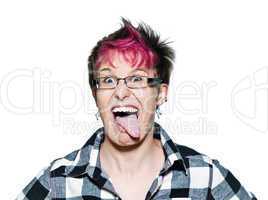 Funny young woman sticking out tongue
