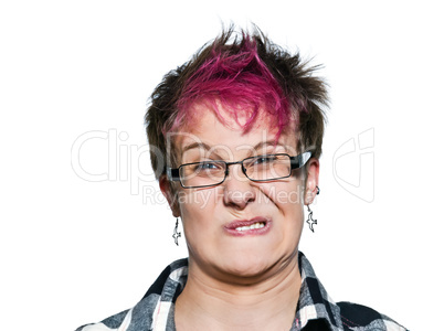 Close-up of an irritated woman making a face
