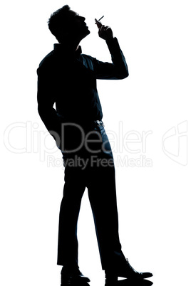 silhouette man smoking cigarette full length