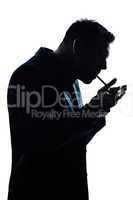 silhouette man portrait lighting smoking cigarette