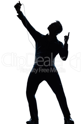 silhouette man full length listening to music