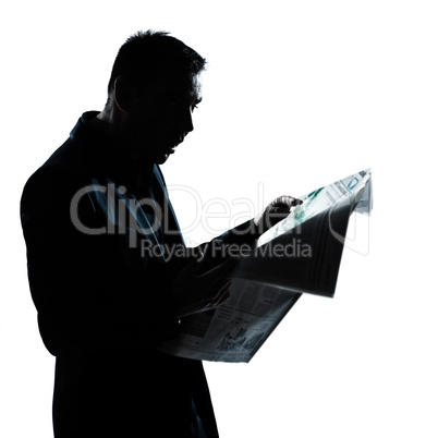 silhouette man portrait reading newspaper surprised