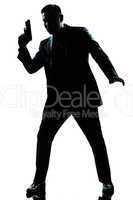 silhouette man spy holding gun