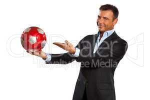 one business man holding showing a soccer ball