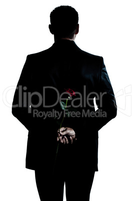 rear view silhouette man portrait holding a rose flower