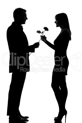 one couple man offering rose flower and woman smiling