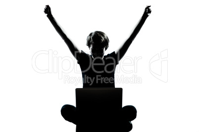 one young teenager boy or girl silhouette computer computing lap