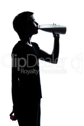one young teenager boy or girl drinking milk silhouette