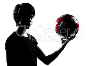 one  teenager boy  girl silhouette holding showing soccer footba