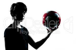 one  teenager boy  girl silhouette holding showing soccer footba