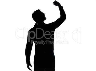 one business man angry fisting up silhouette