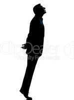 one business man silhouette tiptoe looking up