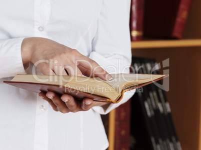 woman Hands holding ancient books