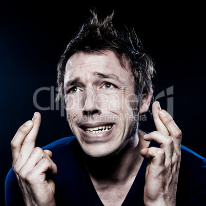 Funny Man Portrait with crossed fingers