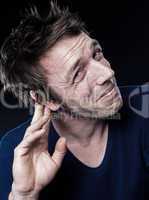 Funny Man Portrait with hearing problem