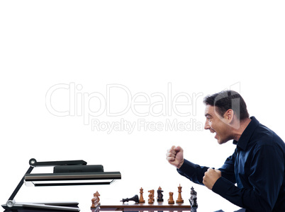 Man playing chess against computer