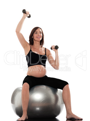 Pregnant Woman Workout weight training sitting on fitness ball