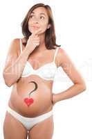 Pregnant woman with heart drawn on the belly