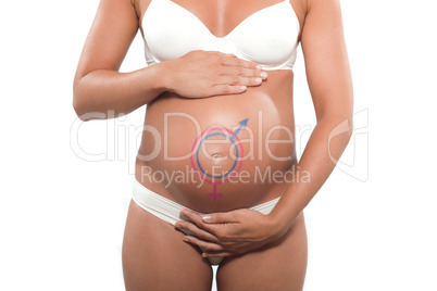 Pregnant woman with heart drawn on the belly