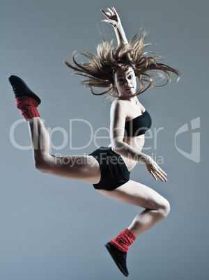 beautiful young woman leap jump