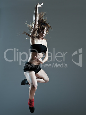 beautiful young woman leap jump