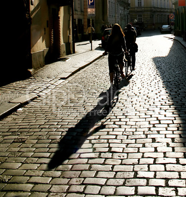 people riding  by bycicle