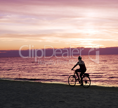 Bicyclist on the beach