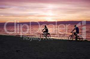 Bicyclists on the beach